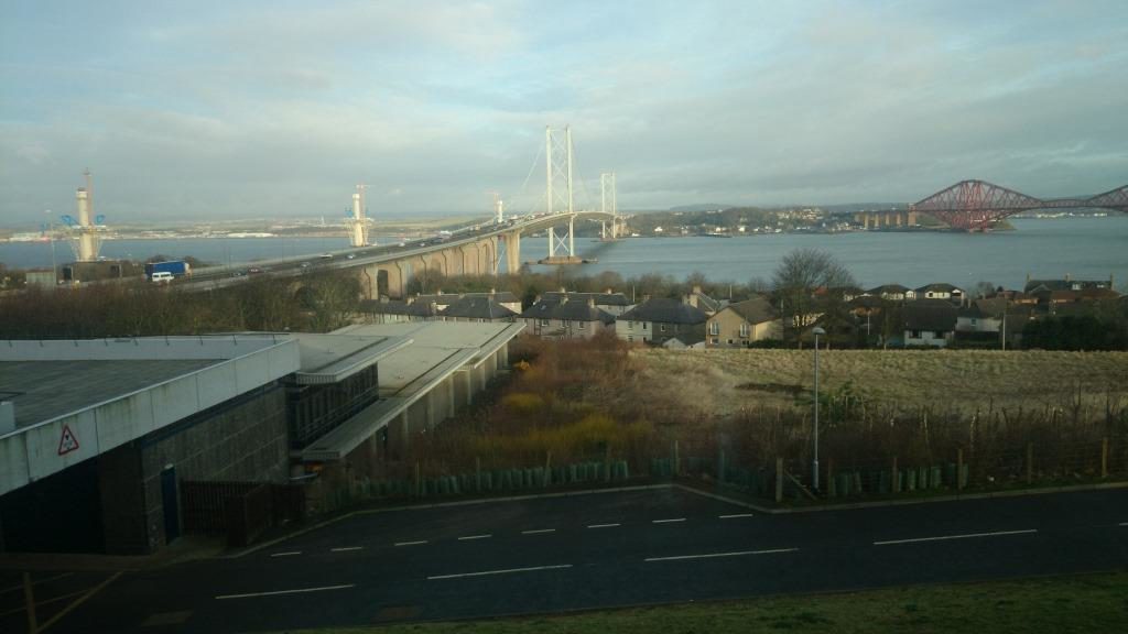 Towers visible along side existing bridge