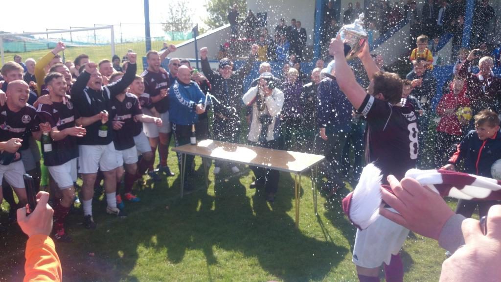 Kelty are presented with the Super League Trophy to the delight of the fans!