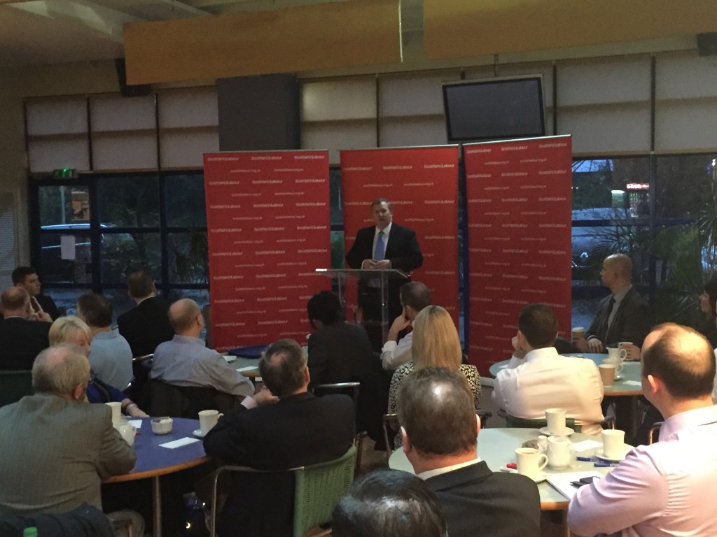 Alex Rowley MSP speaking to business leaders at CR Smith Dunfermline. 