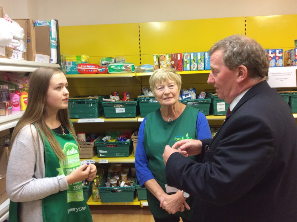 Alex Rowley speaking with volunteers at Dunfermline Food Bank